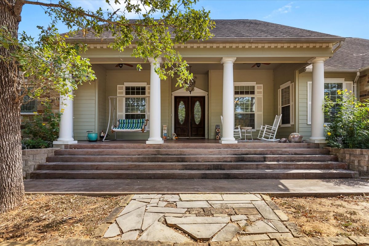 Front porch with white columns